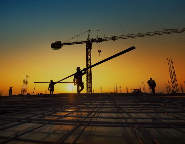 silhouette-construction-workers-fabricating-steel-reinforcement-bar-construction-si-copy-scaled